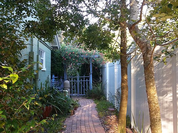 Paved walk with arbor gate