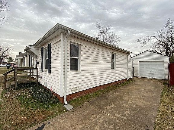 NW corner of house + garage