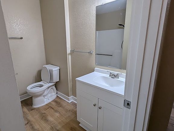 New bath vanity and sink, flooring and lighting. Like new tub/shower.