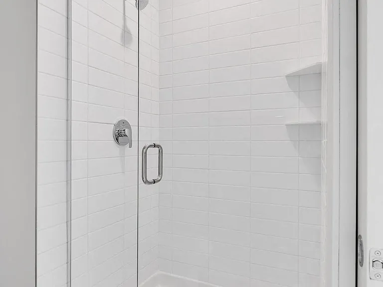 A bright, stylish shower offers a sleek and refreshing space in your contemporary bathroom.