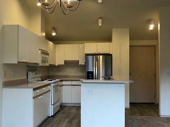 Bright and spacious kitchen and dinning room with skylights over the kitchen area