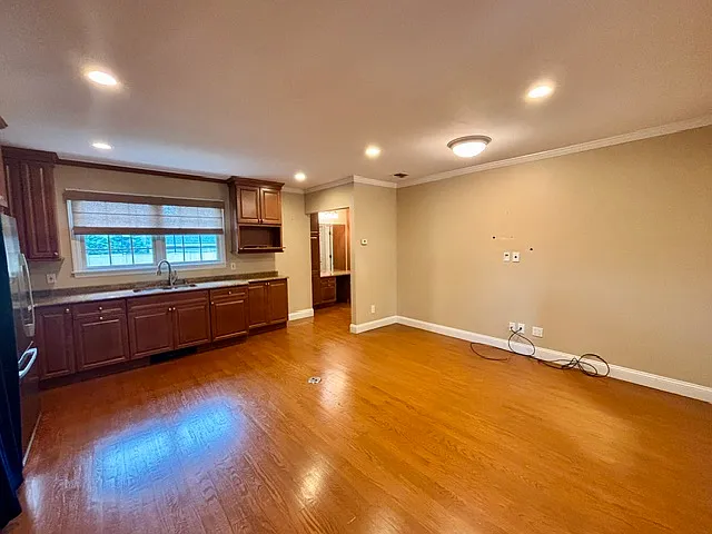 Living & Kitchen Area
Hardwood floors, granite countertops, maple cabinetry, stainless steel refrigerator and a GE convection microwave oven that functions as both a microwave and oven for baking, roasting, and everyday cooking..