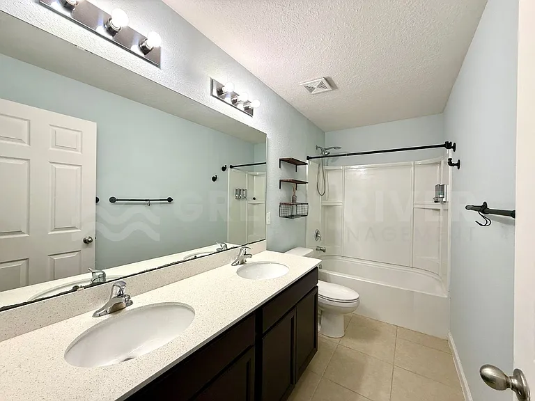 8704 Lake George Cir W — Photo 21