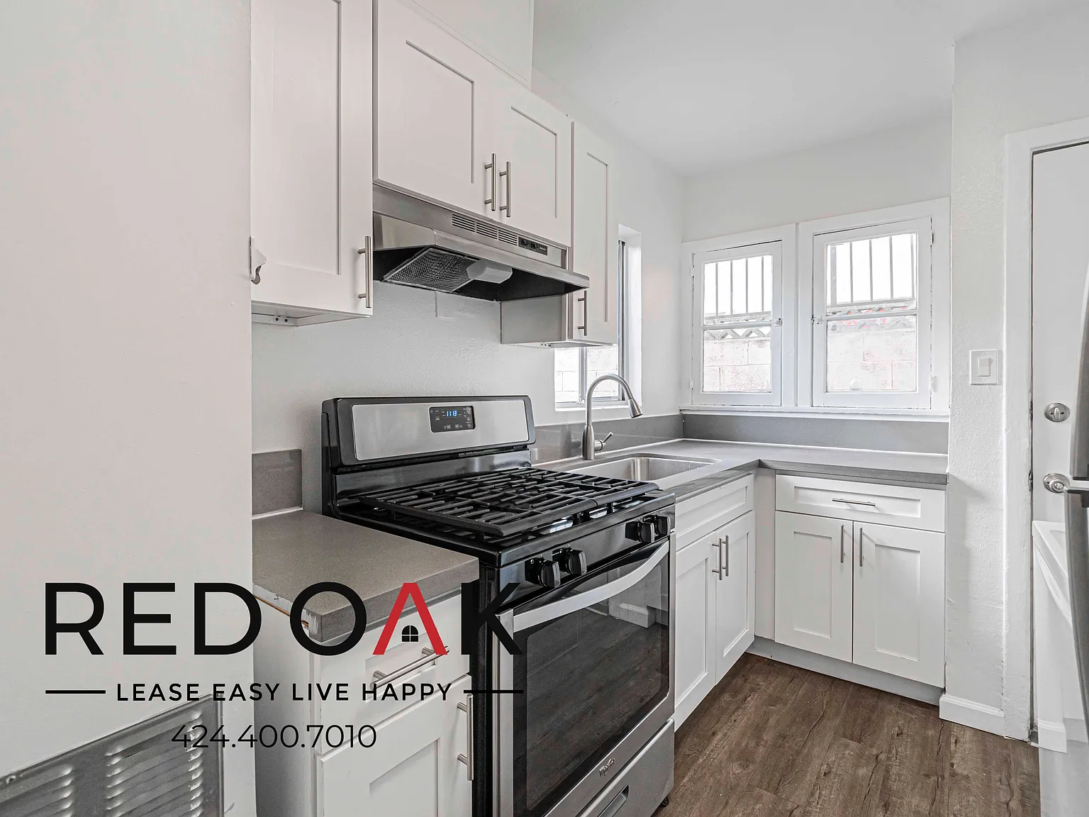~1 Month FREE~ Inviting One Bedroom with Stylish Floors, Ample Storage, and Natural Light ~ In Ea... — Photo 3