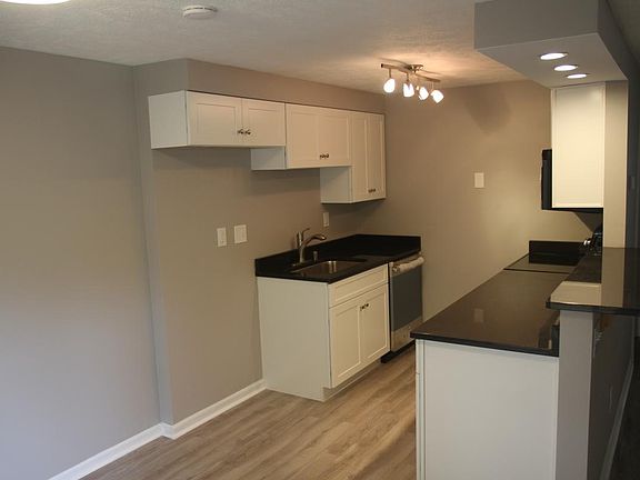 Brand new kitchen with high end cabinets and granite counter