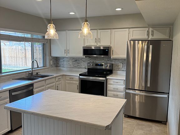 Kitchen with island and appliances