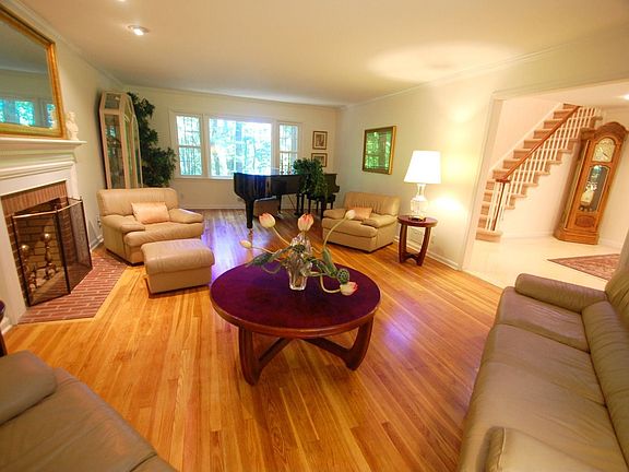 Living Room - hardwood floor, fireplace, front bay window