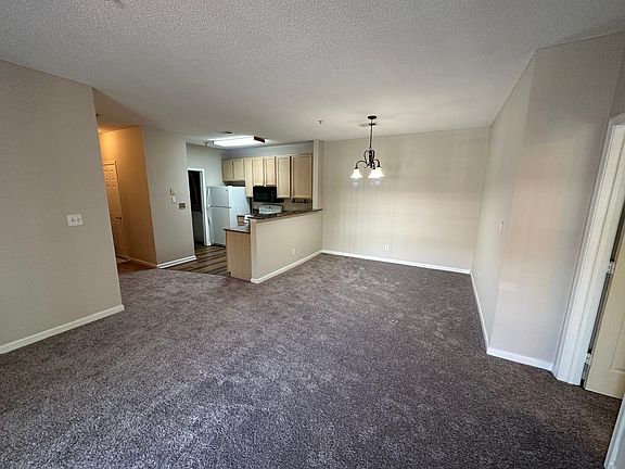 Kitchen open to dining area and living room