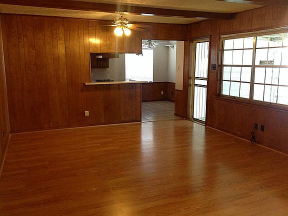 Love all the wood floors in this spacious family room!