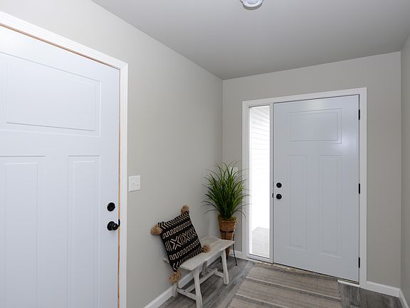 Spacious foyer with closet