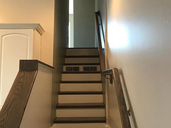 Stairs from kitchen to living area