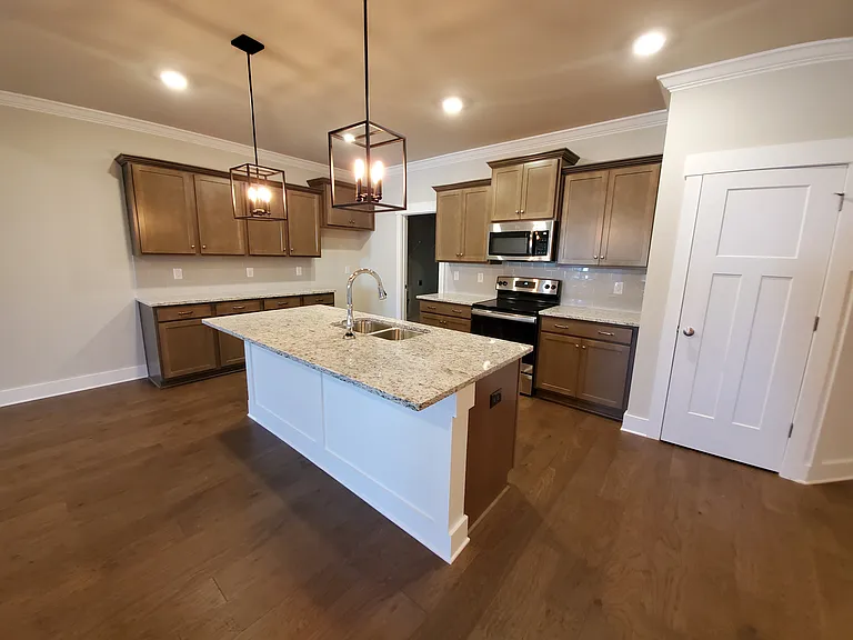 115 Harvester Dr — Photo 5