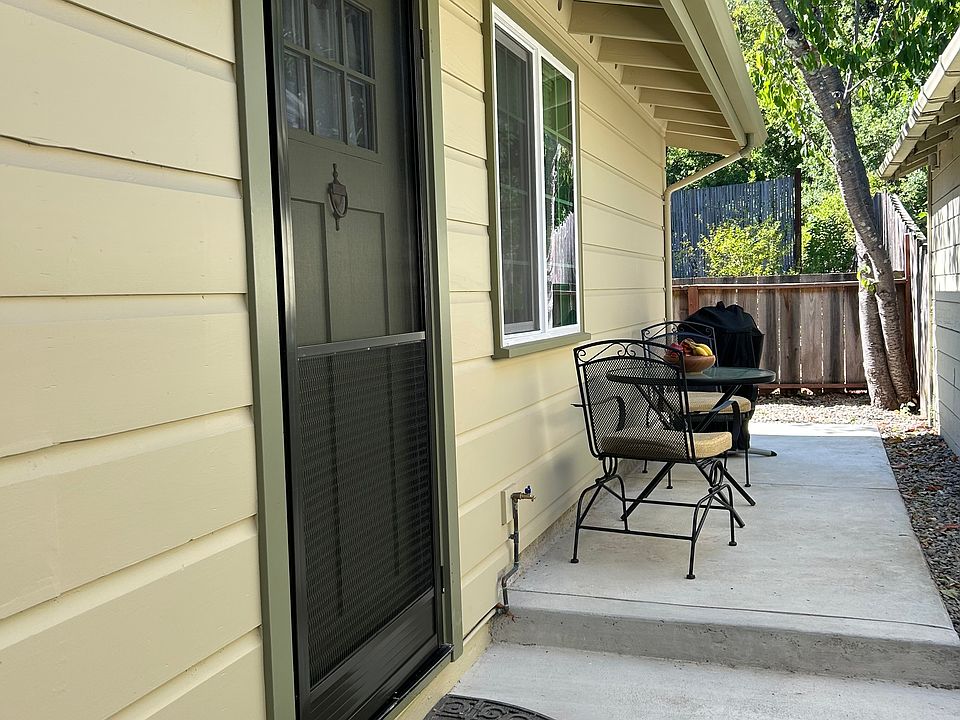 The front door and patio and bbq