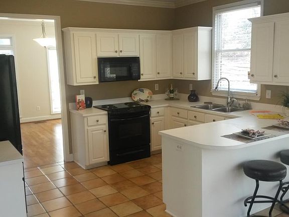 Large family Kitchen with new lighting , huge frig. 