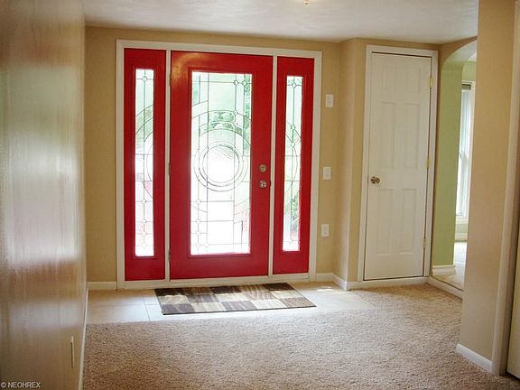 Front entry with ceramic just inside the door.