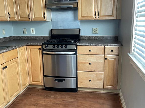 Kitchen includes gas stove.
