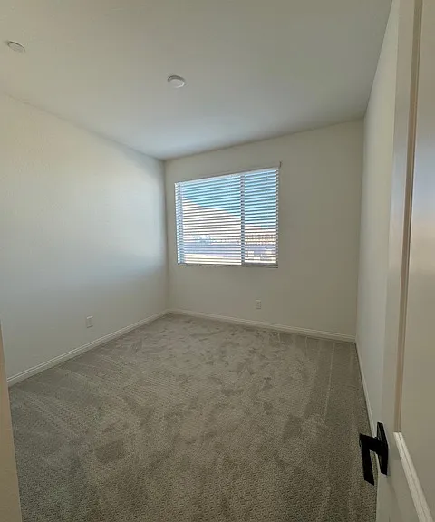 Bedroom 2 with incredible mountains & city light views - modern ceiling fan w/light installed