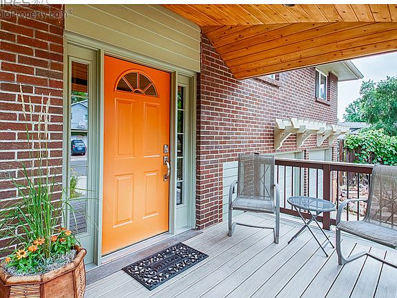 Covered front porch & beautiful front door