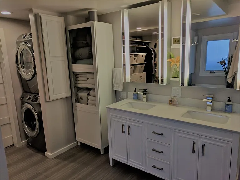 Master Bath: Vanity, Linen Cabinets, and W/D