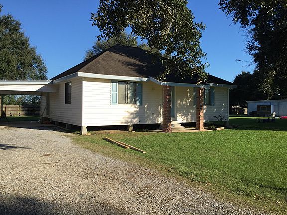 Front view with carport