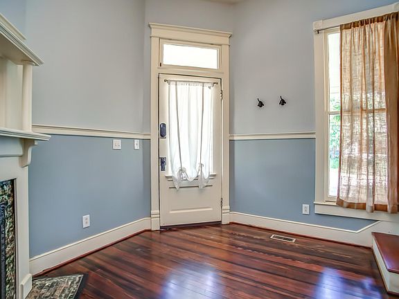 Newly re-finished original hardwood floors