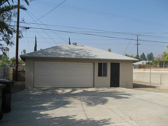 Detached rear 2 car garage + work area