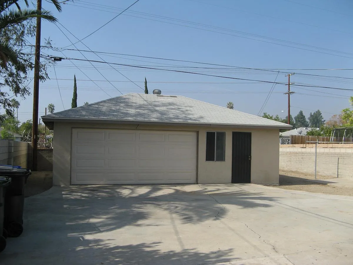Detached rear 2 car garage + work area - 8556 Kempster Ave