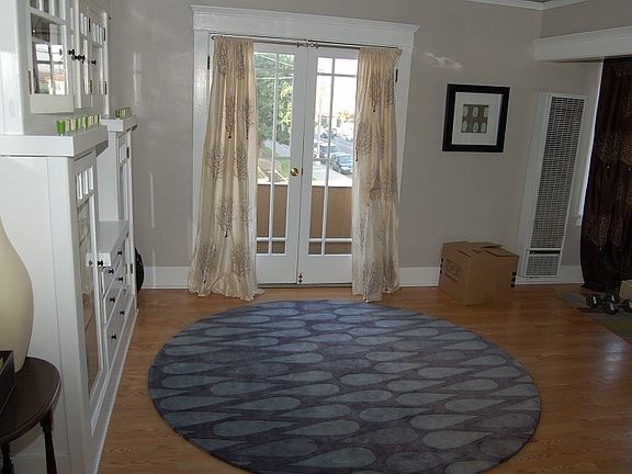 Dining, doors to private balcony