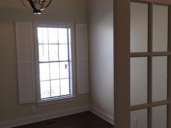 Beautiful dining room/office with french doors. Can be third bedroom.