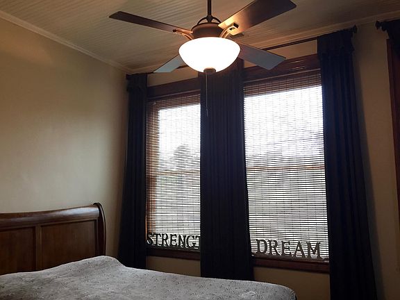 The cozy master bedroom is convenient to a huge walk-in closet.