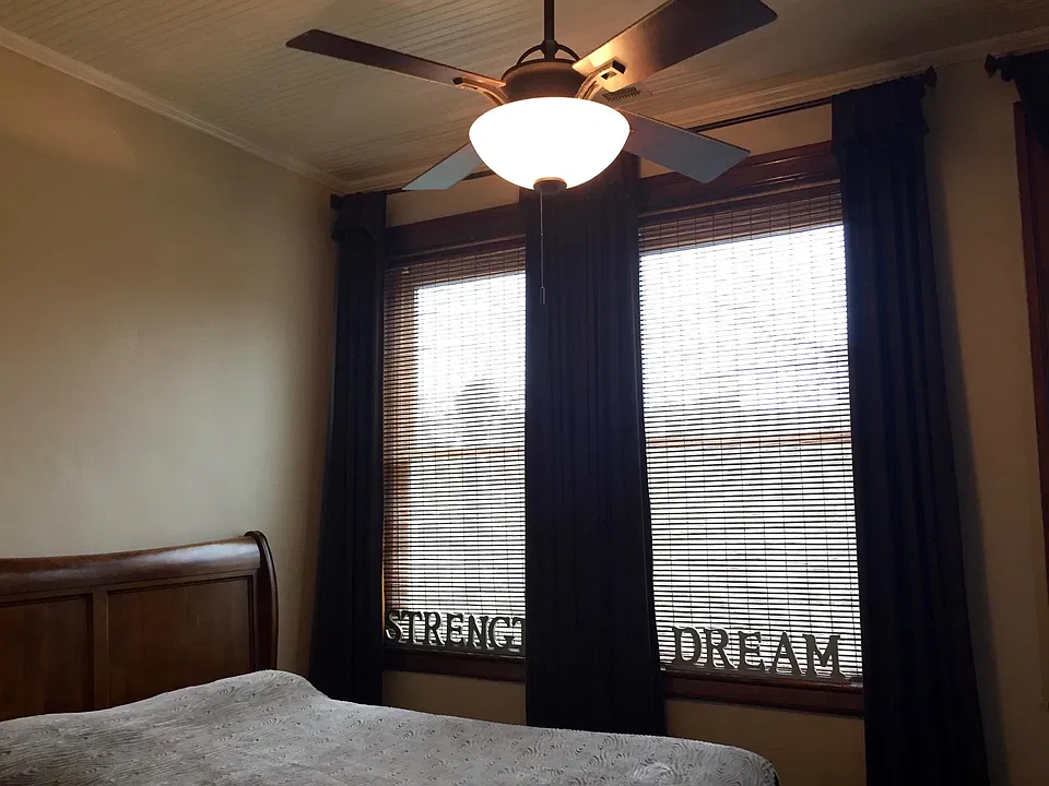 The cozy master bedroom is convenient to a huge walk-in closet.