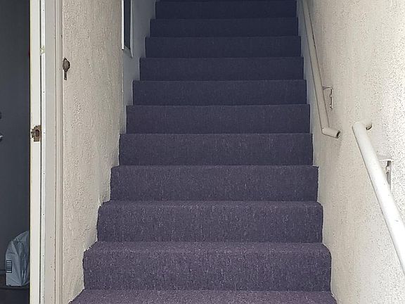 Upstairs apartment, laundry to the left