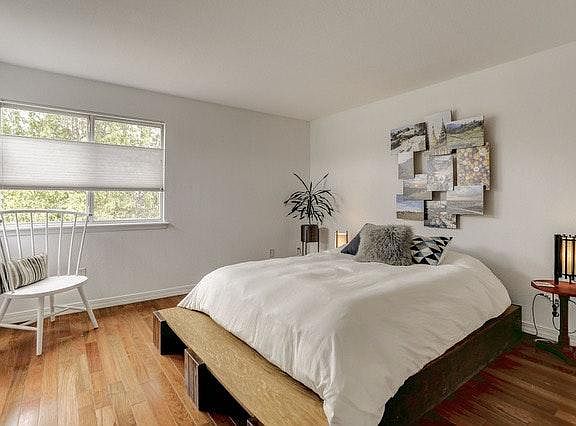 Master bedroom (top floor) with lots of light and hardwoods.