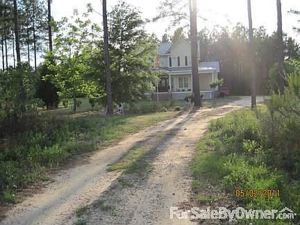 View of home as coming down driveway