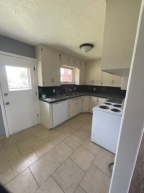 1st image of 718 E 23rd Ave #1