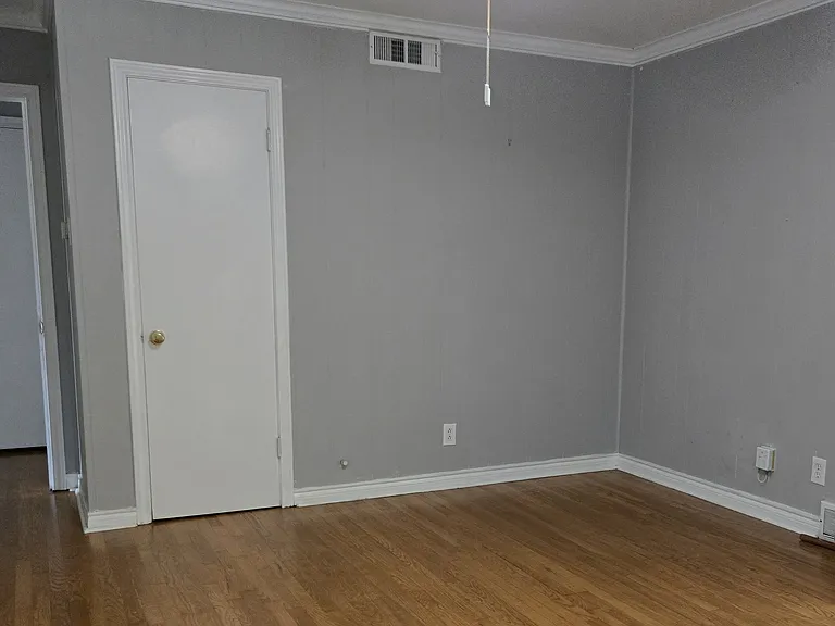This is the den/3rd (large) bedroom. Again, not my best photo taking, but this spacious room has sliding glass doors to the back patio and has a view of the backyard. Original owners used this as a den. We always used it as a bedroom :)