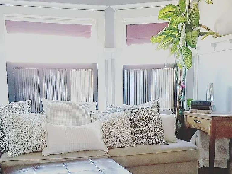 Large room just off the kitchen can be used as a family room or dining room. So many possibilities to suit your family's lifestyle. This room also features a built-in curio and drawers, built-in bench seating and wood window shudders for privacy.