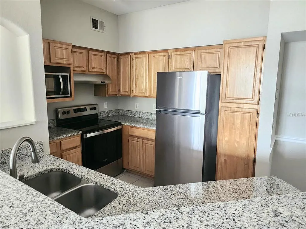 Building Photo - 3468 Soho St #201
