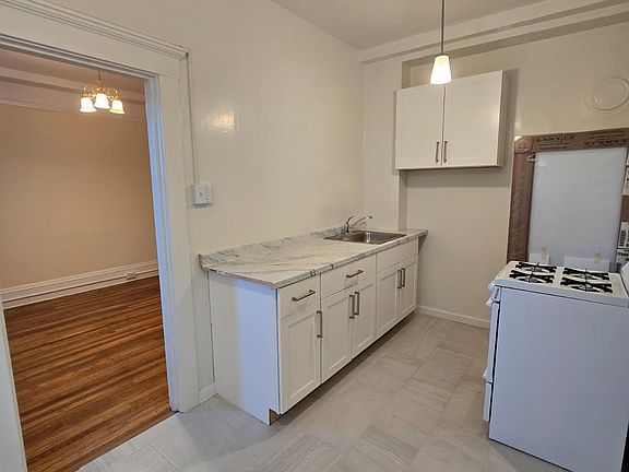 Kitchen with view of cabinets
