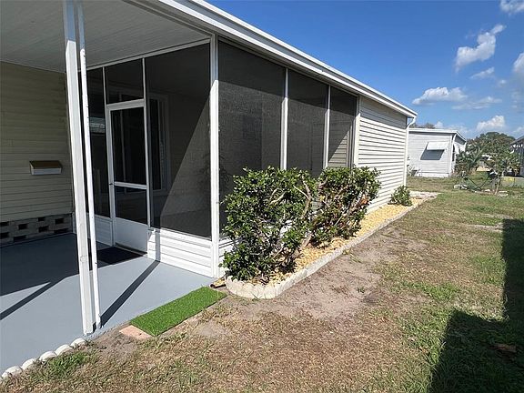4th image of 103 Pindo Palm St W