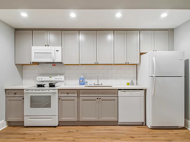 Beautiful kitchen with all new appliances and stocked with basic equipment
