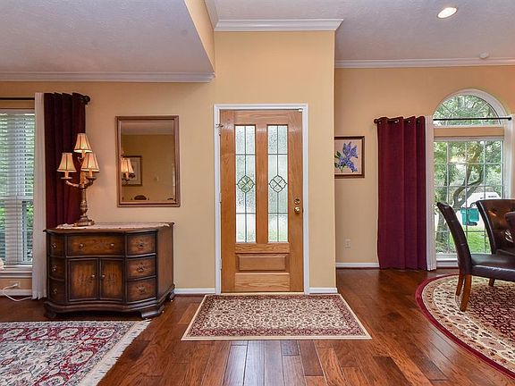 Front entry leads to formal dining room and formal living room areas. The formal living room is currently being used as an additional dining area. Perfect for large gatherings