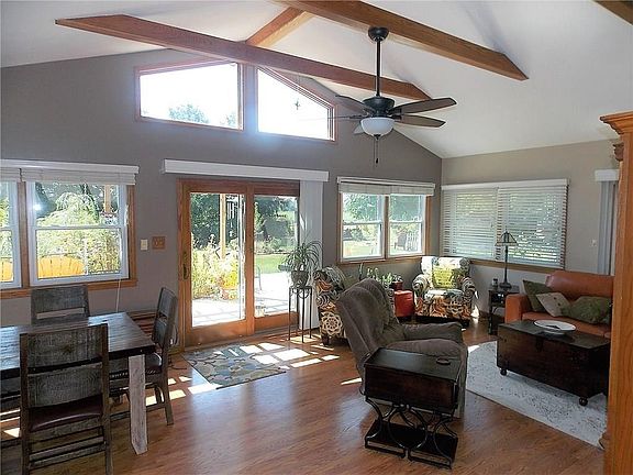 Great room with lots of windows to bring outside in.