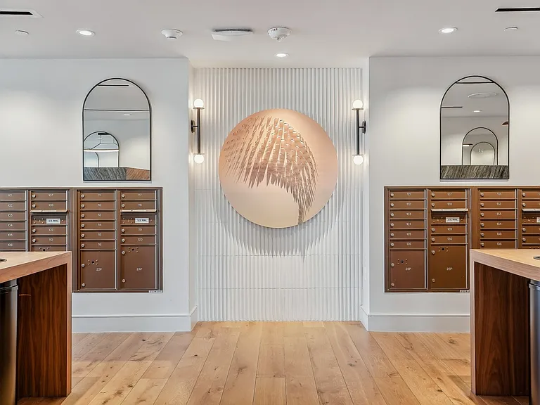 A thoughtfully designed mailroom that blends functionality with elevated design.