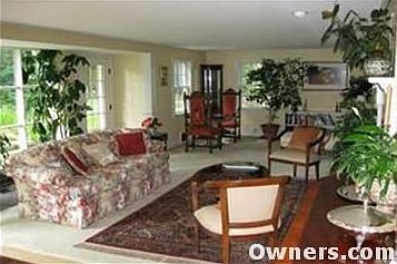 Living room with fireplace and large picture windows