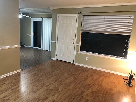 LIVING AND DINING ROOM DOWN STAIRS.