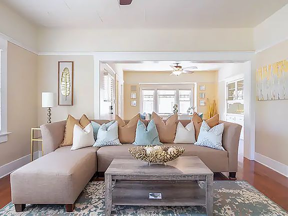 This comfortable sofa seat 4 adults. Ottoman is movable.