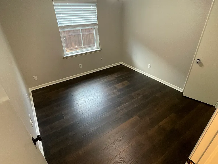 Guest bedroom #2 with large picture window.