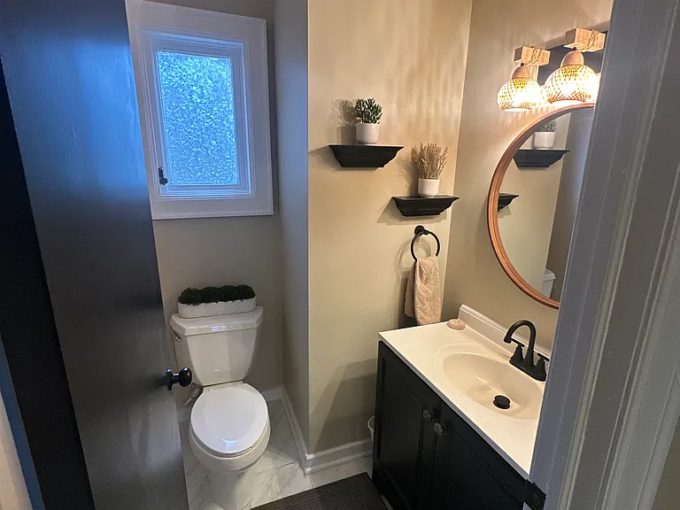 completely renovated 1/2 bath off kitchen