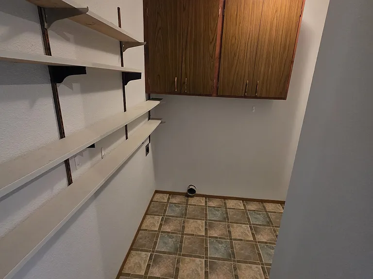 laundry room with W/D hookup around corner (W/D not included)